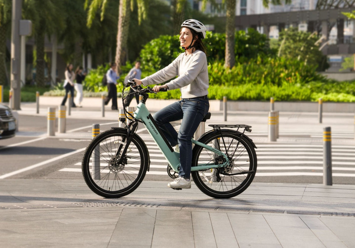 Cruising around town on a Puckipuppy commuter electric bike.