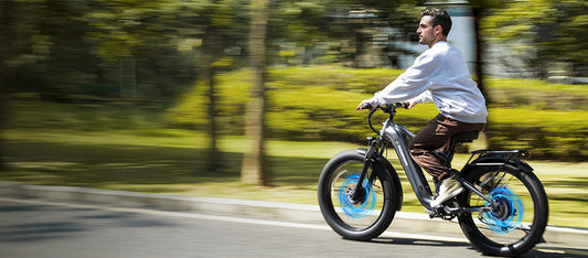 A man is riding an UL-certified electric bicycle on the road.