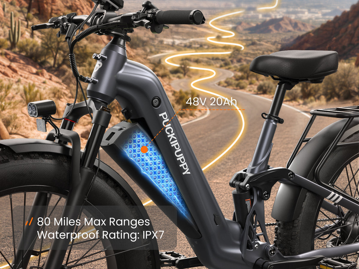 48V 20Ah battery on a Metallic Gray electric mountain bike with 80 mile range and IPX7 waterproof rating.