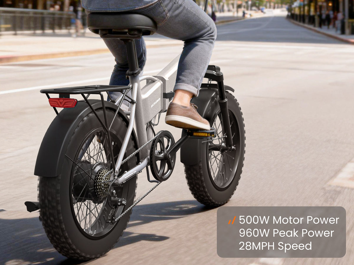 Rider using a PUCKIPUPPY Dachshund folding electric bike with a 500W motor, 960W peak power, and 28 mph max speed.